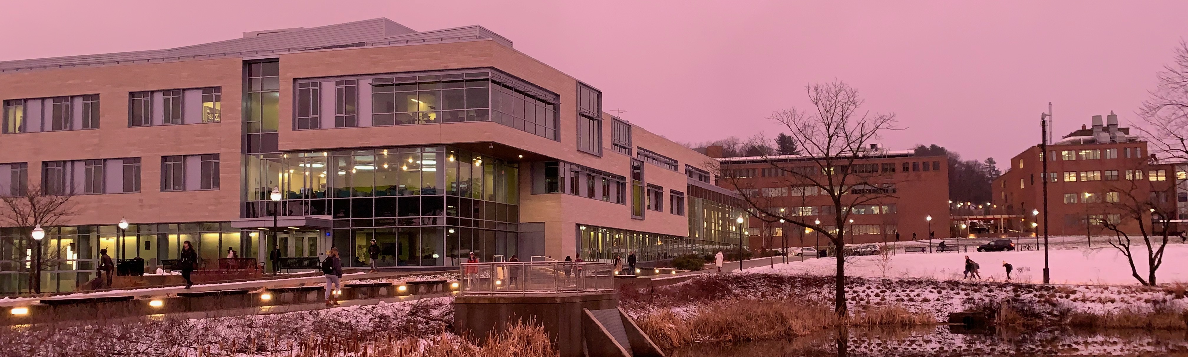 A picture of the Integrated Learning Center at UMass Amherst during a particularly pink dusk